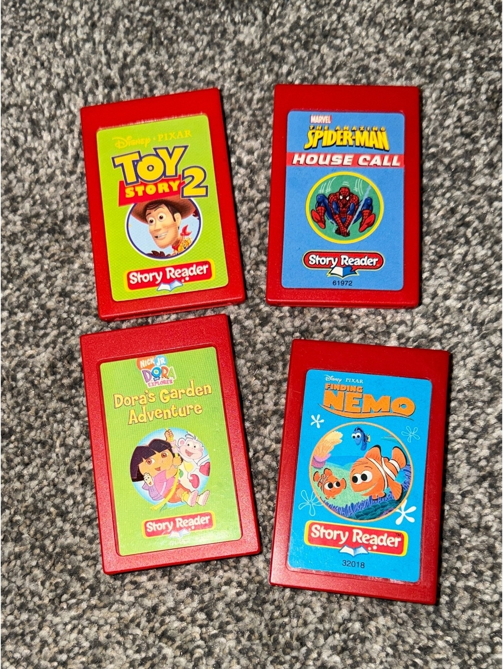 LeapFrog Story Reader Cartridge Lot - Toy Story 2, Spider-Man, Dora, & Nemo